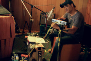 Claude Carranza on guitar